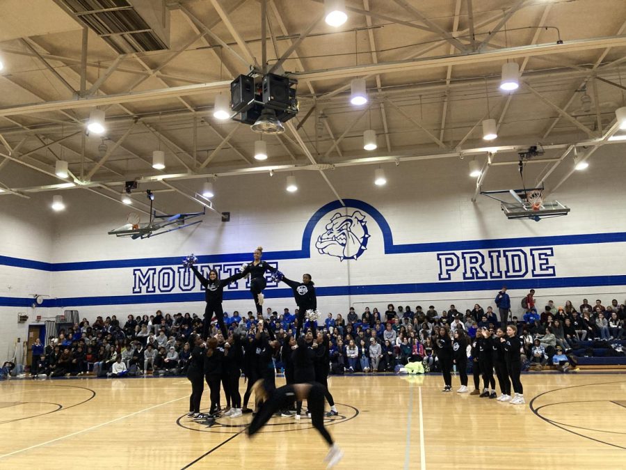 Mountie Cheer performs a routine at the pep rally.